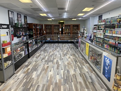 M.k smoke shop, photographed by a Google contributor